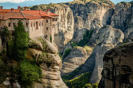 panoramic photography of castle on top of cliff thumbnail