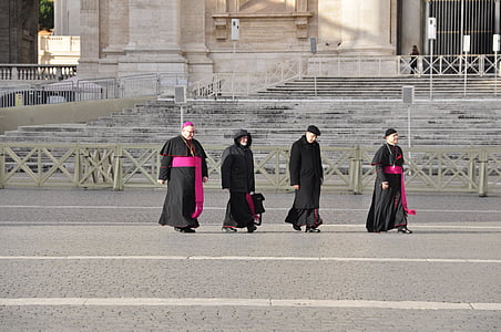 four people walking on the road thumbnail