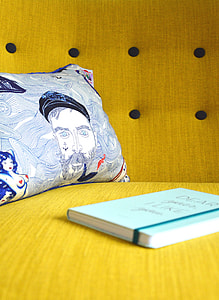book near pillow on desk thumbnail