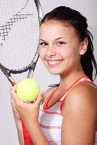 girl holding tennis racket thumbnail