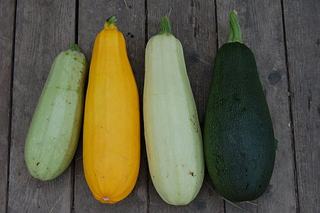 four vegetables on wooden panel thumbnail