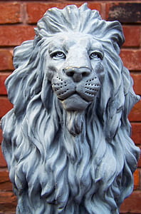 close-up photography of gray lion statue thumbnail