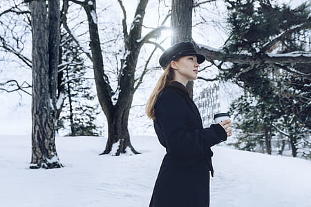 Woman Standing Snowy Wood Photo thumbnail