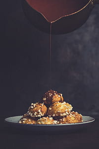 chocolate cookies while pouring chocolate liquid thumbnail