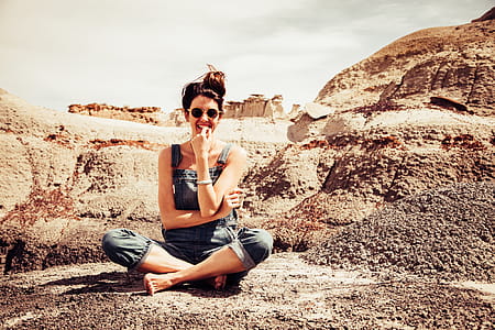 Woman Smiling Wearing Denim Dungarees and Sunglasses thumbnail