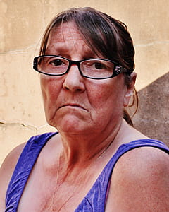 woman wearing purple tank top thumbnail