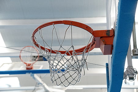 photo of red and blue metal basketball hoop thumbnail