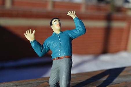man figurine during daytime thumbnail