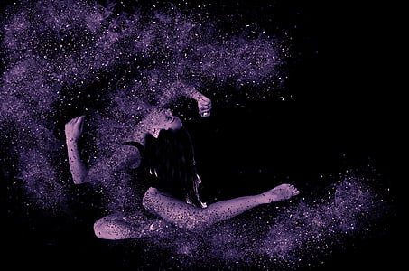 woman looking upward with glitter surrounding her thumbnail