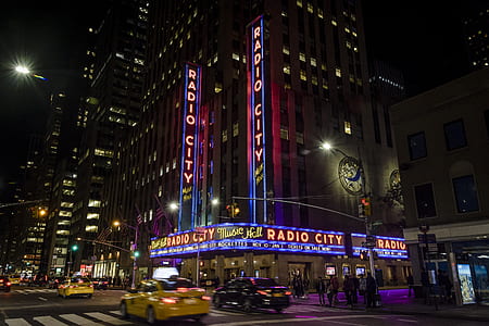 Radio City commercial building in front of asphalt road thumbnail