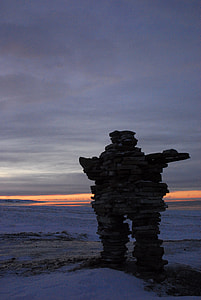 Inuksuk in the Tundra Landscape in Quebec, Canada thumbnail