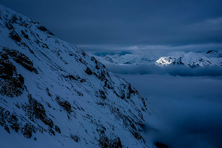 photo of snowy mountain during night time thumbnail