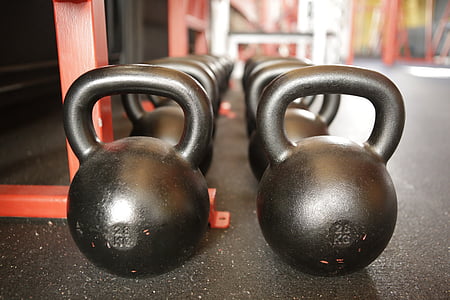 close up photography of black kettle bell lot thumbnail