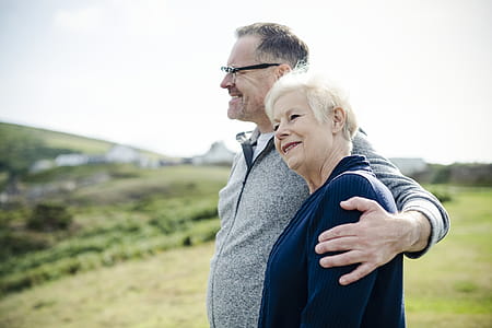 Smiling Man Holding Woman's Left Shoulder thumbnail
