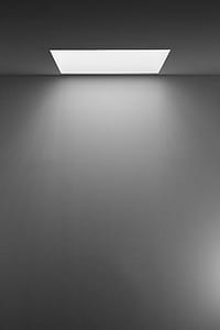 Grayscale Photography of White Concrete Wall thumbnail