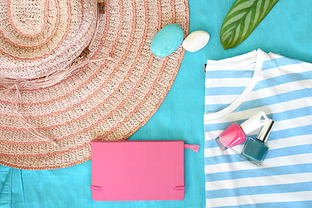 two pink and green nail lacquer on blue and white striped shirt thumbnail