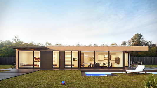 beige concrete house under cloudy sky during daytime thumbnail