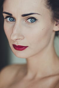 shallow focus photography of woman with red lipsticks thumbnail