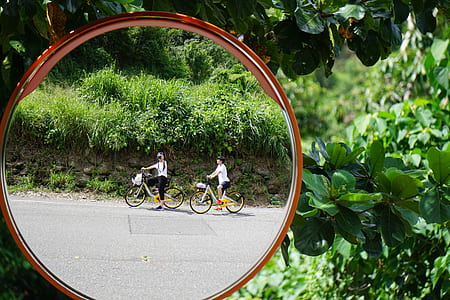 two person riding on bikes thumbnail