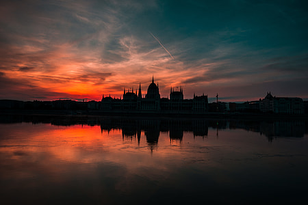 silhouette of building during sunset thumbnail