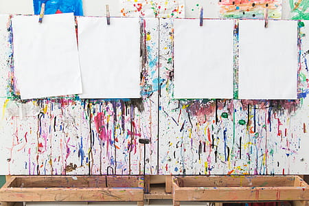 Blank Paper On Paint Easel Photo thumbnail