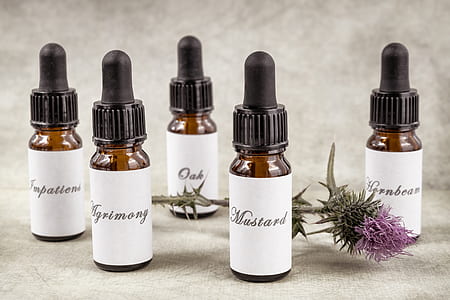 five assorted-labeled dropper bottles thumbnail