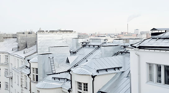 white and gray roof houses during daytime thumbnail