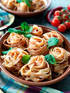 noodles in brown ceramic bowl thumbnail