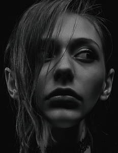 Grayscale Photography of Woman Looking Sideways thumbnail