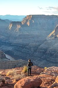 woman on mountain during daytime thumbnail