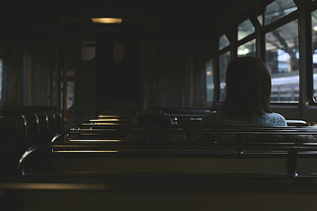 woman sitting on pew thumbnail