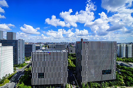 gray concrete buildings at daytime thumbnail