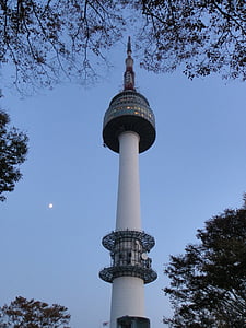white and grey tower under blue sky thumbnail