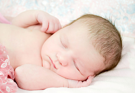 sleeping baby in close-up photography thumbnail