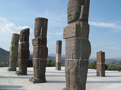 brown concrete statues during daytime thumbnail