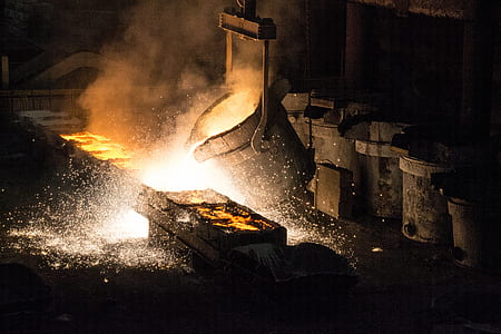 gray bucket with molten metal thumbnail