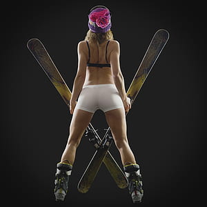 woman in front of snow ski boards thumbnail