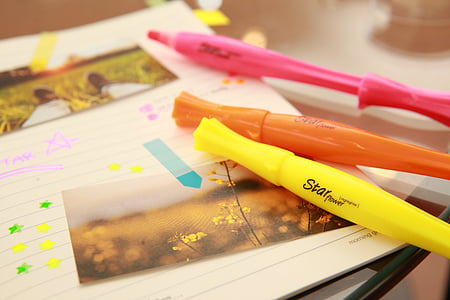 three yellow, pink, and orange pens thumbnail