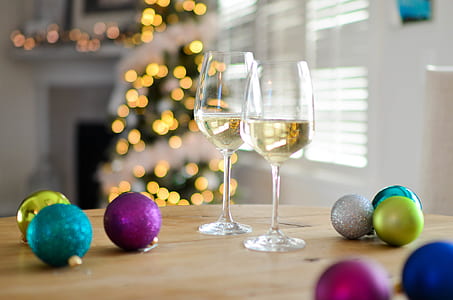 Two Champagne Glasses Near Baubles thumbnail