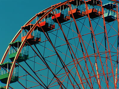 photo of red ferris wheel at daytime thumbnail