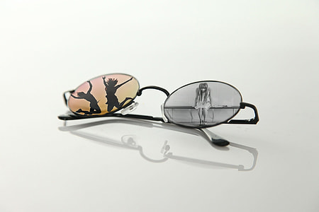 black hippie glasses against white background thumbnail
