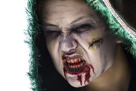 person with halloween makeup showing teeth thumbnail
