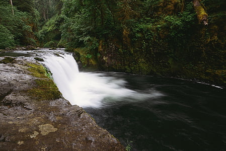 mossy waterfall during daytime thumbnail