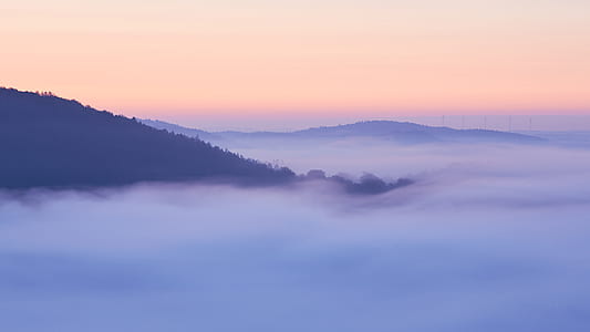 foggy mountain during daytime thumbnail
