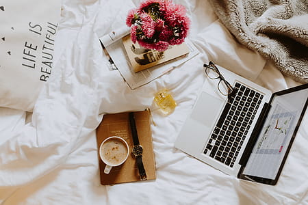 Morning coffee in bed. Working in bed thumbnail