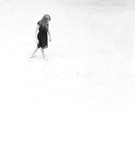 woman walking on sand thumbnail