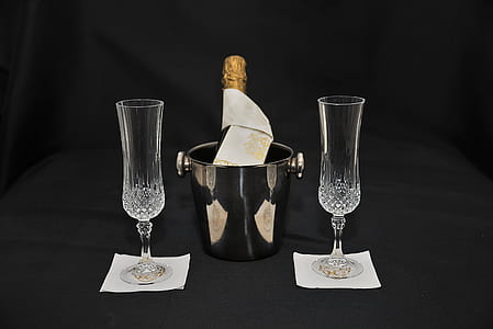 two clear footed champagne flutes with bucket thumbnail