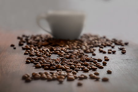 coffee beans and white ceramic teacup thumbnail