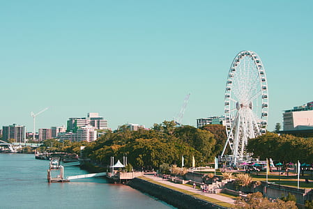 Ferris wheel near wooden dock thumbnail