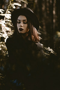 woman in black hat thumbnail